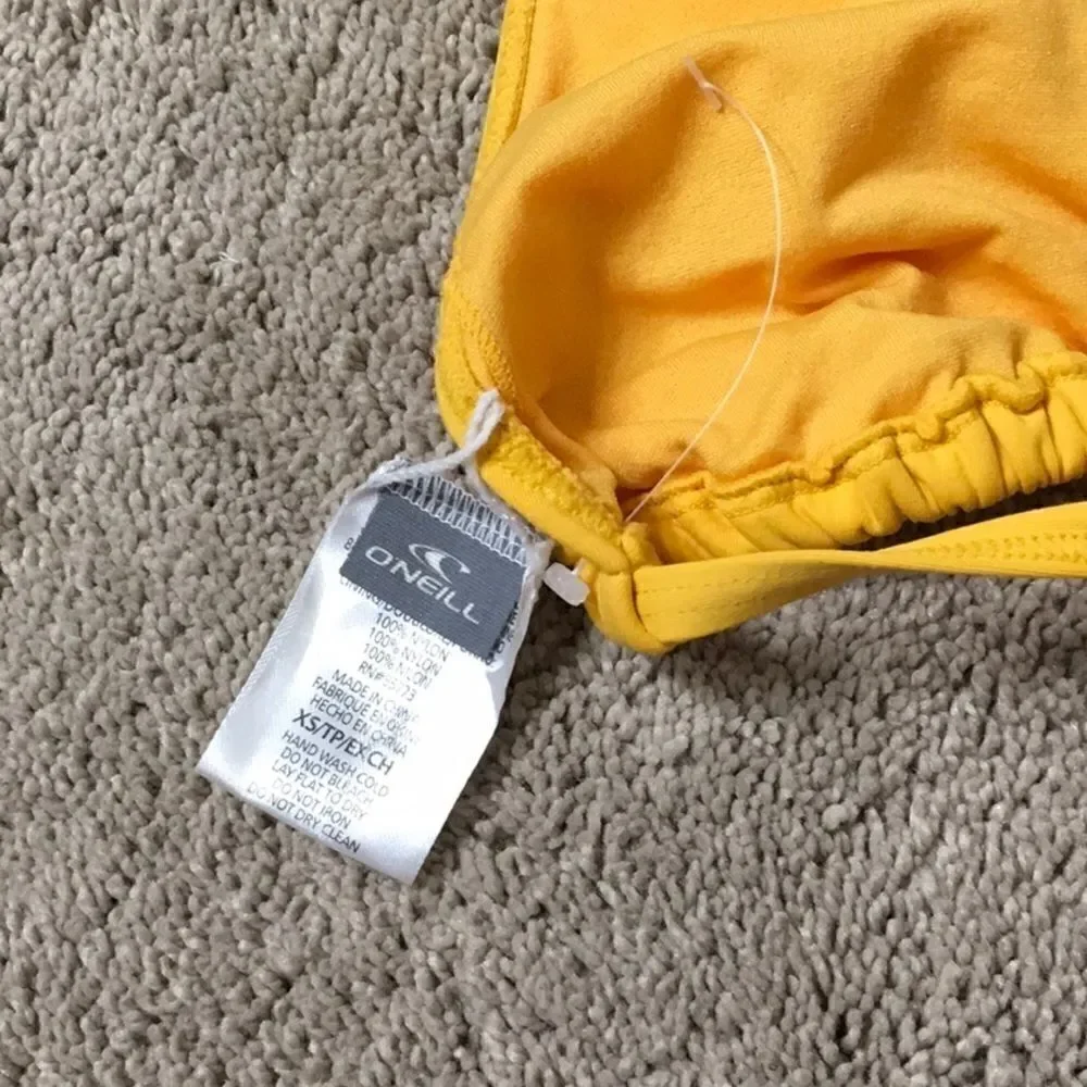 O’Neill golden yellow strappy bikini set. NWT
